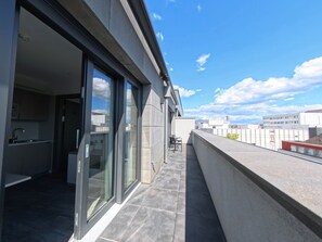 Deluxe-dobbeltværelse - byudsigt | Terrasse/gårdhave