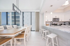 Condo, 4 Bedrooms | Private kitchen | Fridge, oven, coffee/tea maker
