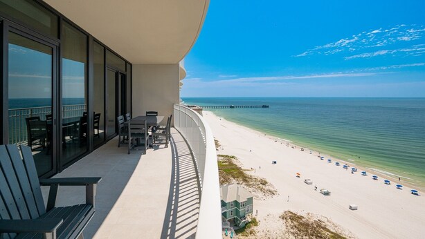 A balcony with a view of the beach and ocean. - Phoenix Gulf Shores Ii 1501 4 Bedroom Condo (Gulf Shores)