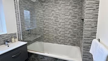 Hair dryer, towels, soap, shampoo