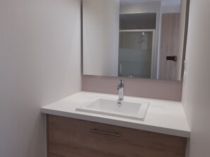 Shower, eco-friendly toiletries, hair dryer, soap