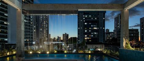 Indoor pool, pool umbrellas, pool loungers
