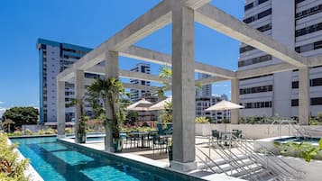 Indoor pool, pool umbrellas, sun loungers