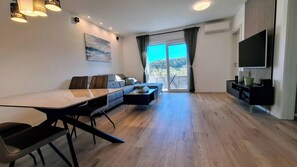 Lejlighed - 1 soveværelse - balkon - udsigt til have | Stue