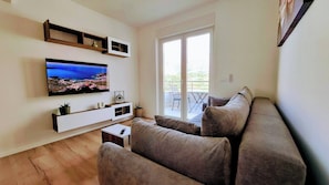 Apartment, 1 Schlafzimmer, Balkon, Gartenblick | Wohnzimmer