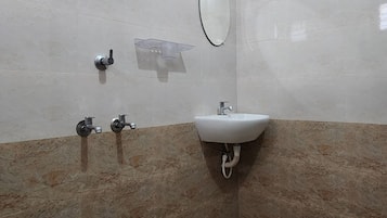 Shower, bidet, towels, soap