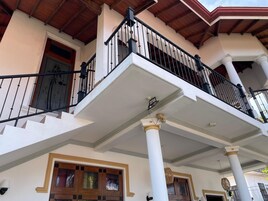 Deluxe Double Room, Garden View | Balcony view