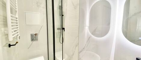 Hair dryer, towels, soap, shampoo