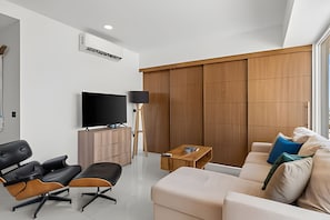 Signature Apartment | Living area | LED TV