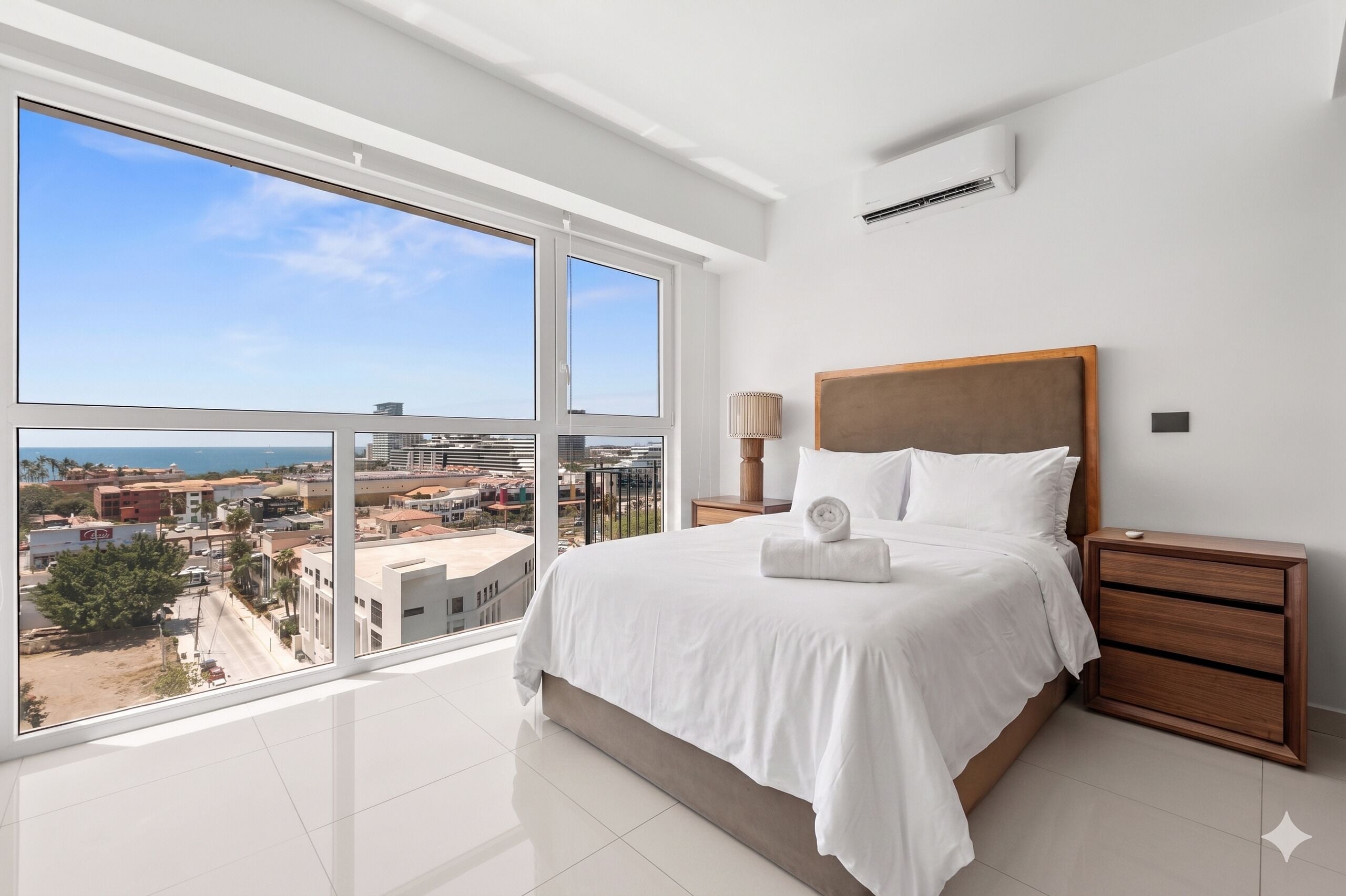 Premium bedding, laptop workspace, blackout curtains, soundproofing
