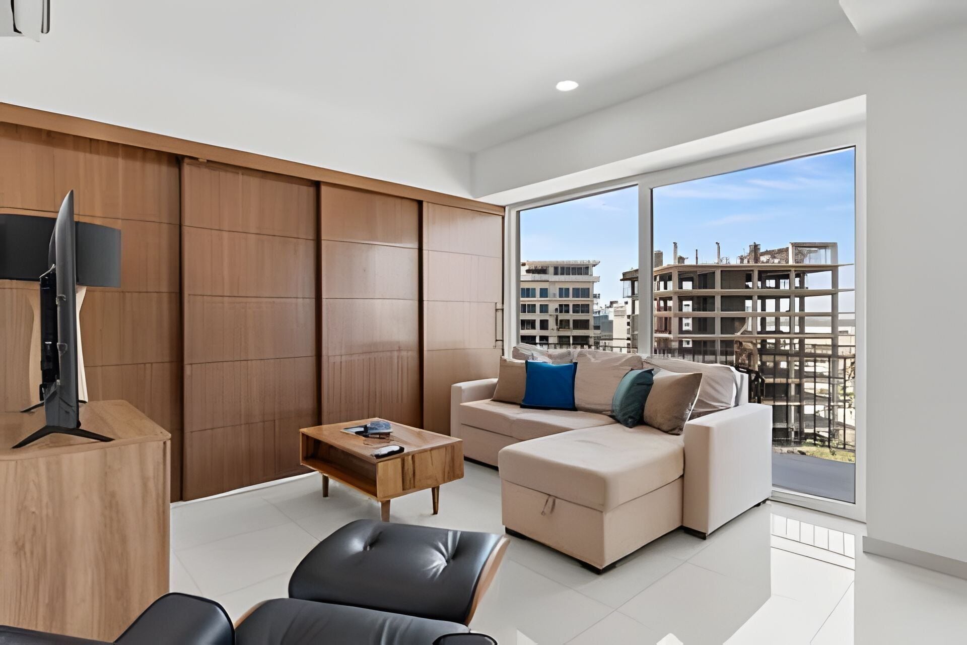 Signature Apartment | Living area | LED TV