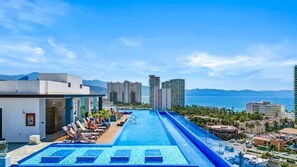 Deluxe Apartment | Pool | Outdoor pool, pool loungers - Zoho Skies by Monyxbnb (Puerto Vallarta)