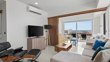 Signature Apartment | Living area | LED TV