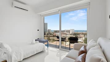 Gallery Apartment | Premium bedding, laptop workspace, blackout drapes, soundproofing