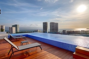 Outdoor pool, sun loungers