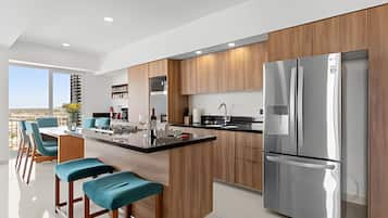 Signature Apartment | Private kitchen | Full-size fridge, microwave, oven, stovetop