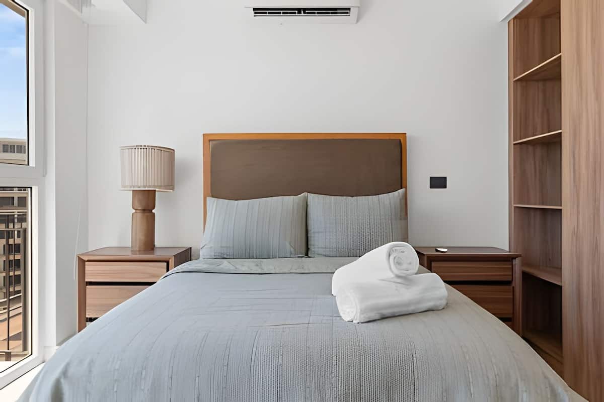 Signature Apartment | Egyptian cotton sheets, premium bedding, blackout drapes, soundproofing