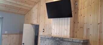 Charming house on the St. Mary's river in Sault Ste. Marie, freighters out front