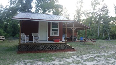 Friendlys River Retreat private 
Rustic Camping Cabin sleeps 4+with tent camping