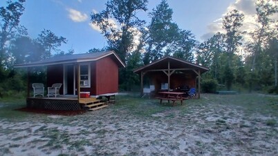 Friendlys River Retreat private 
Rustic Camping Cabin sleeps 4+with tent camping