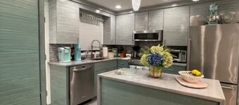 Stunning West End Condo with 2 bedrooms plus loft with bed and views of the bay