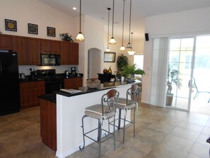 Fridge, coffee/tea maker, cookware/dishes/utensils