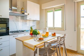Fridge, oven, stovetop, highchair