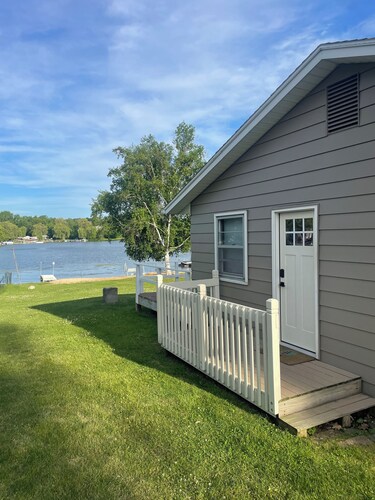 3-bedroom cottage on beautiful Big Pine Island Lake. Sandy beach, huge deck.