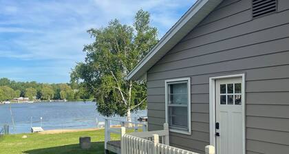 3-bedroom cottage on beautiful Big Pine Island Lake. Sandy beach, huge deck.