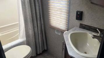 Shower, towels, soap, shampoo