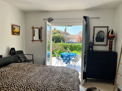 Master suite in single-storey house with terrace