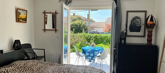 Master suite in single-storey house with terrace