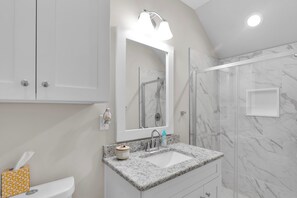 Hair dryer, towels, soap, toilet paper