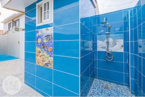 Shower, hair dryer, towels, soap