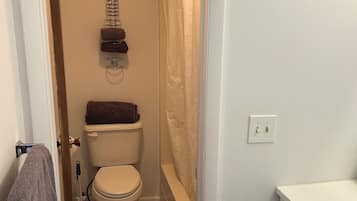 Hair dryer, towels, soap, toilet paper