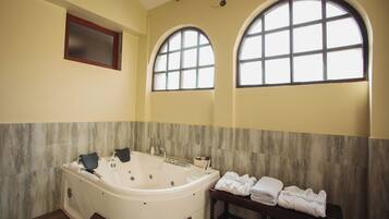Superior Studio Suite | Bathroom | Hair dryer, towels, soap, shampoo