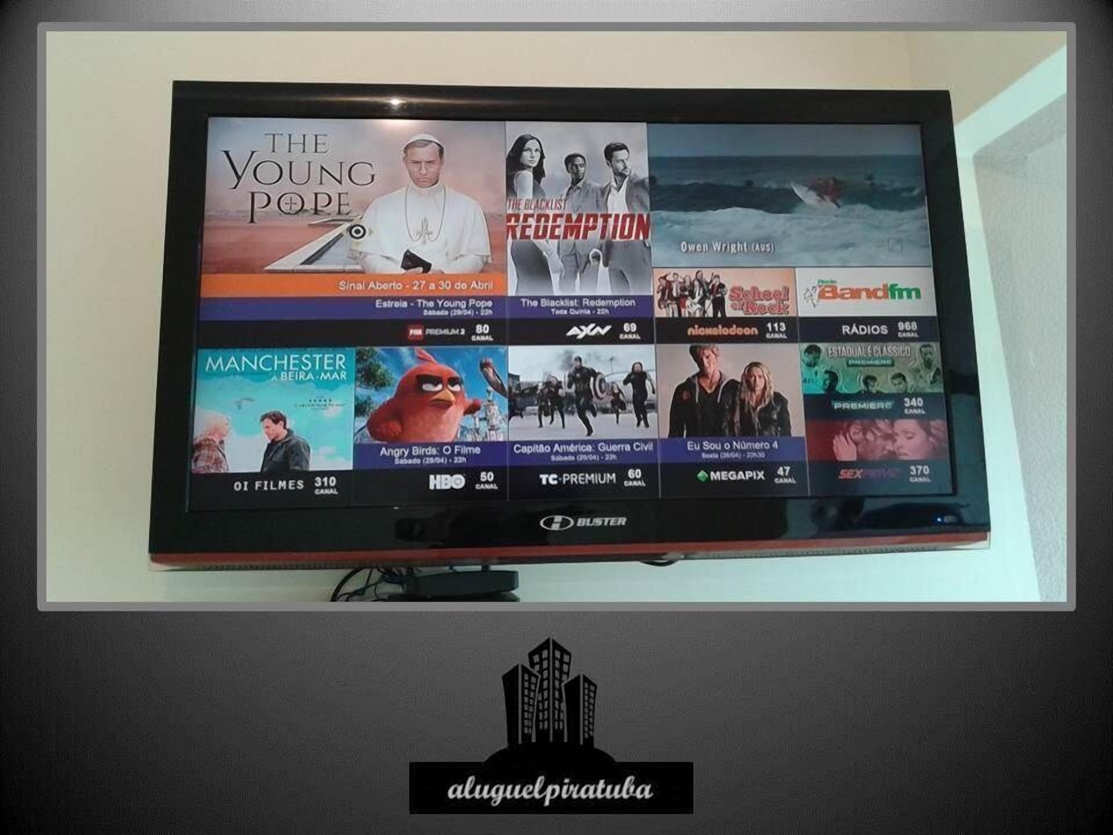 A television displaying various movie and TV show titles.