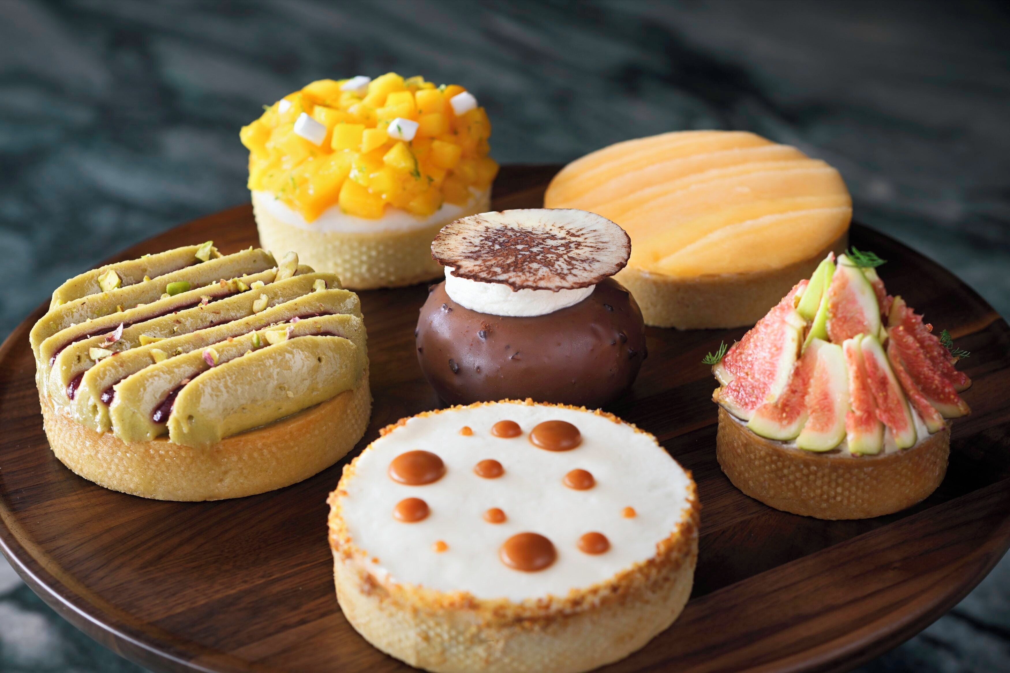 A variety of desserts on a plate.