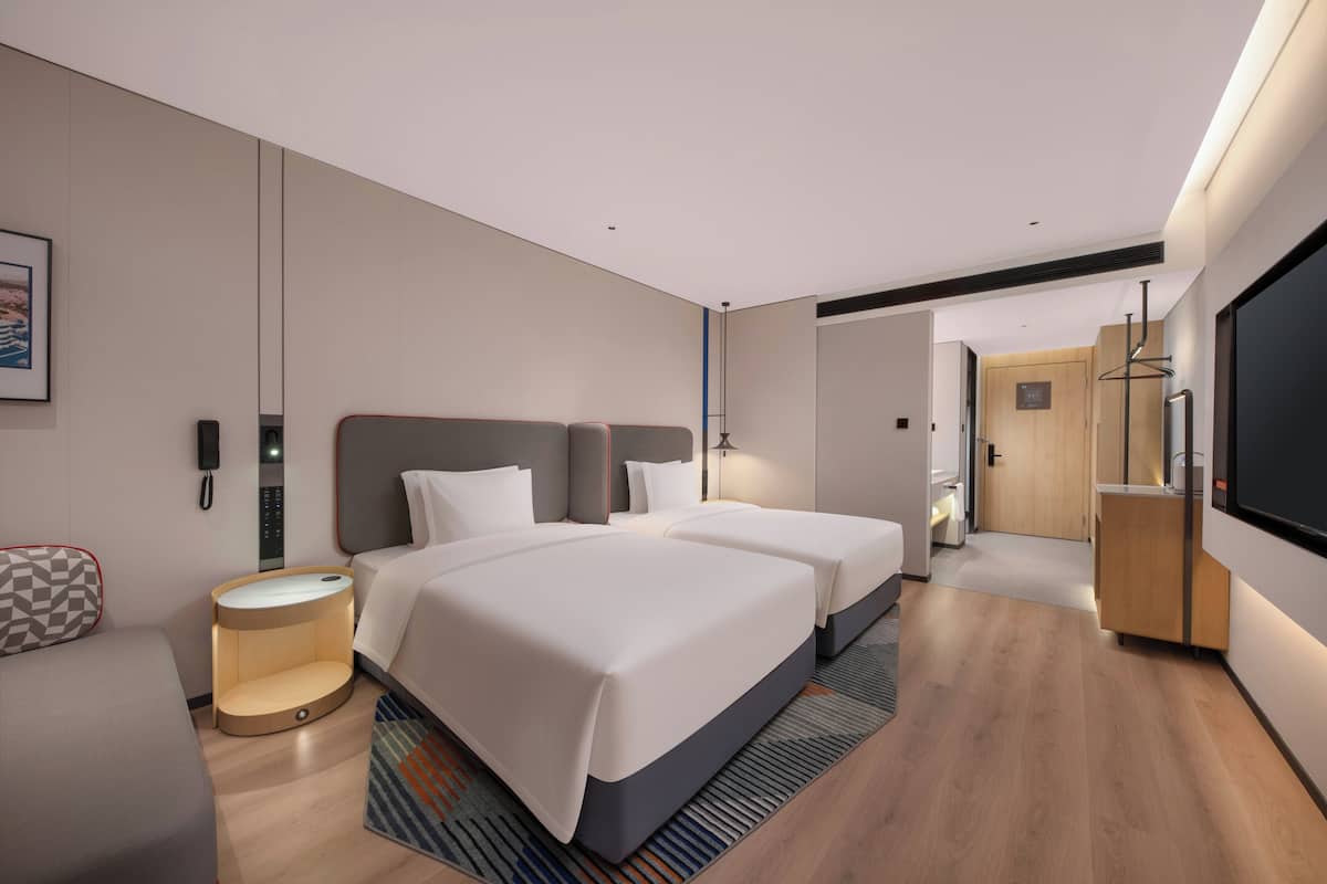 Premium bedding, down comforters, desk, laptop workspace