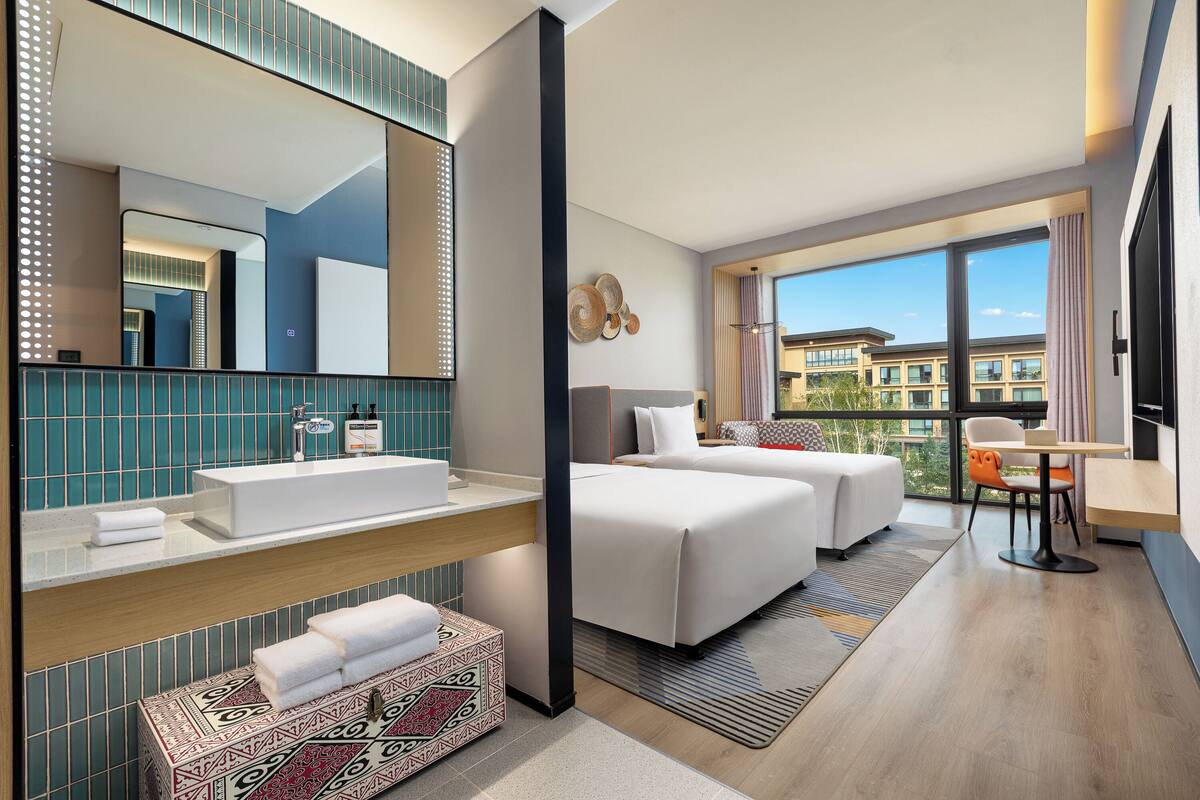 Premium bedding, down duvets, in-room safe, desk