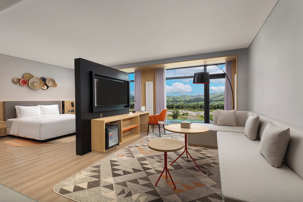 Suite, 1 King Bed, Balcony (Grassland View) | Premium bedding, down comforters, in-room safe, desk