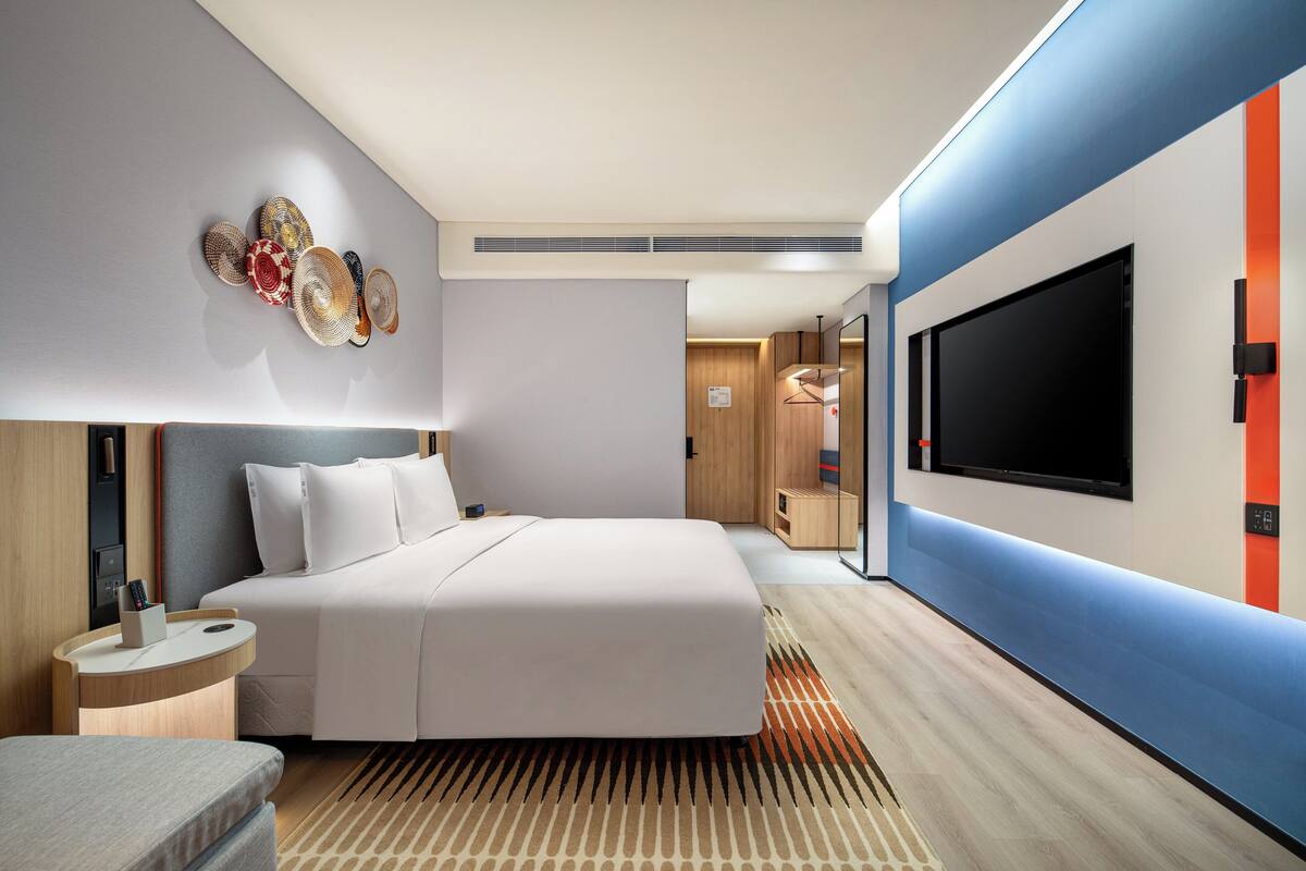 Luxe beddengoed, donsdekens, een kluis op de kamer, een bureau