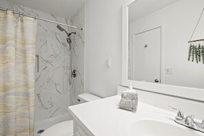 Hair dryer, towels, soap, toilet paper