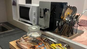 Fridge, microwave, coffee/tea maker, toaster