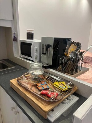 Fridge, microwave, coffee/tea maker, toaster
