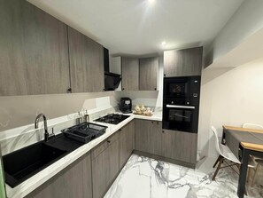 Fridge, microwave, coffee/tea maker, toaster