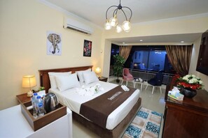 Premium bedding, down comforters, memory foam beds, minibar