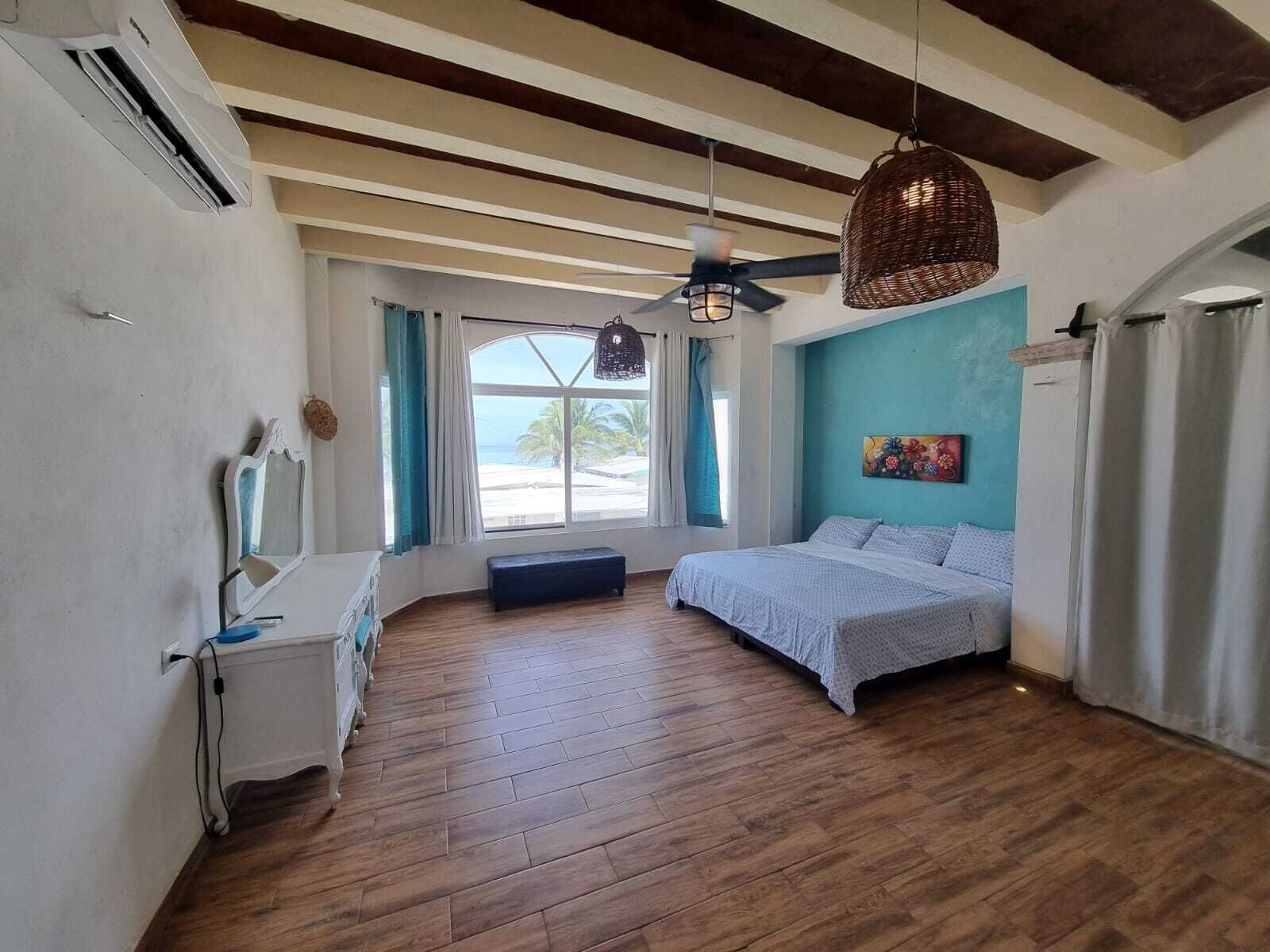 Casa Confort, vista a la playa | 3 habitaciones, caja de seguridad en la habitación y cortinas blackout 