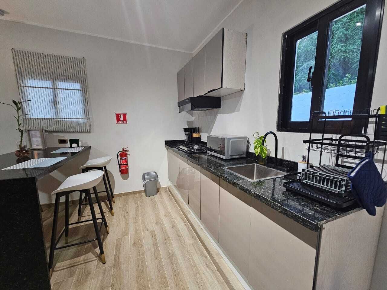Fridge, microwave, coffee/tea maker, toaster