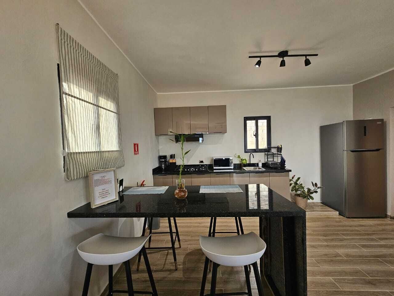 Fridge, microwave, coffee/tea maker, toaster